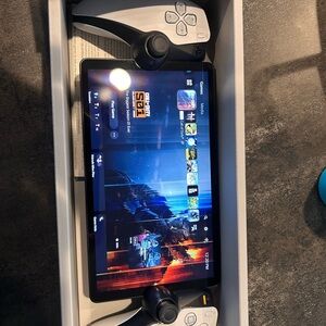 Sony Console with Black and White Controllers